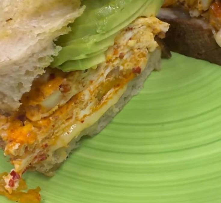 Protein sourdough stack with avocado and eggs